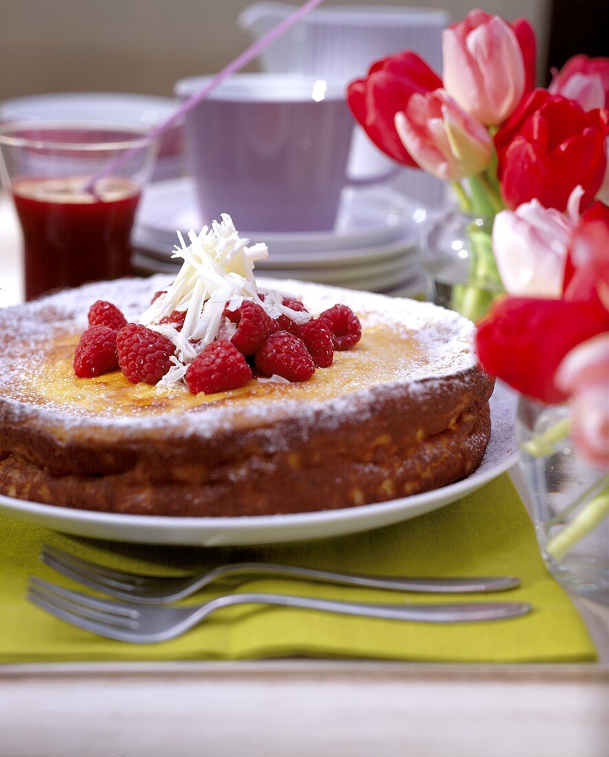 Quark cake with white chocolate and raspberries