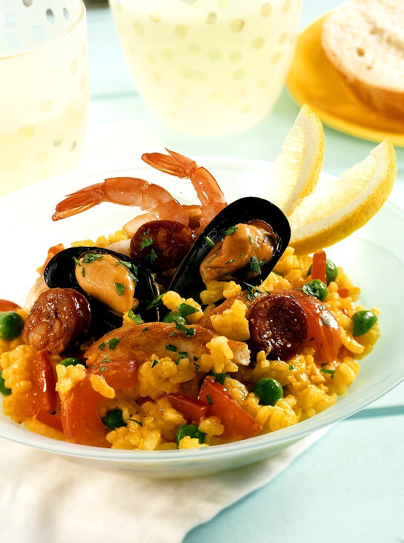 Paella with chicken, seafood and chorizo
