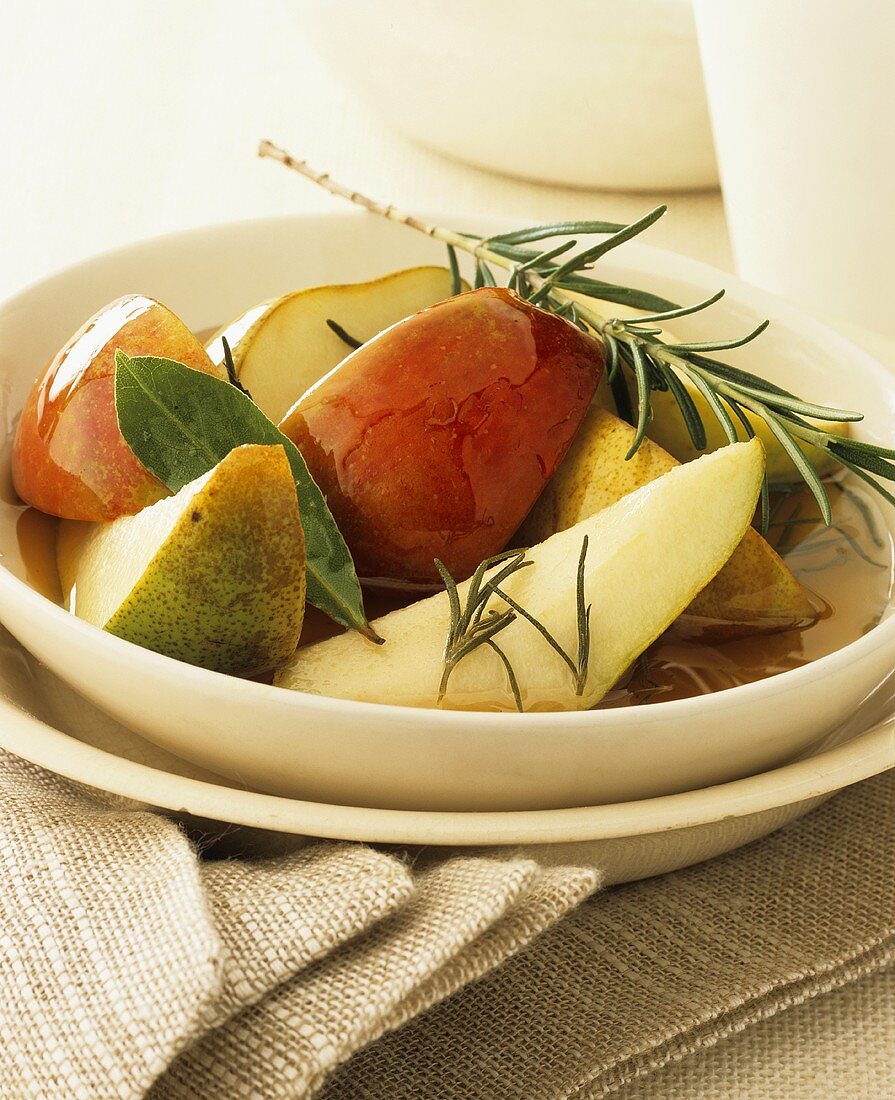 Apple and pear salad in rosemary and apple syrup