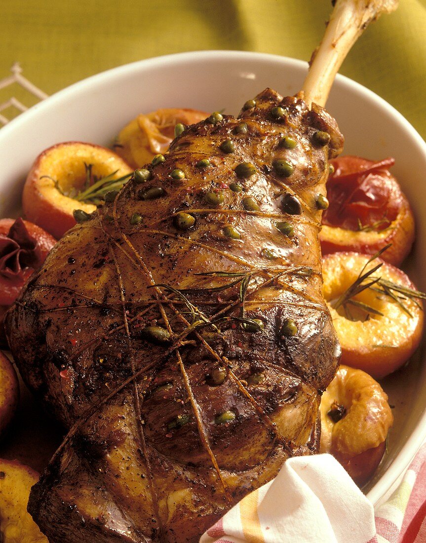 Leg of lamb with pistachios and rosemary peaches