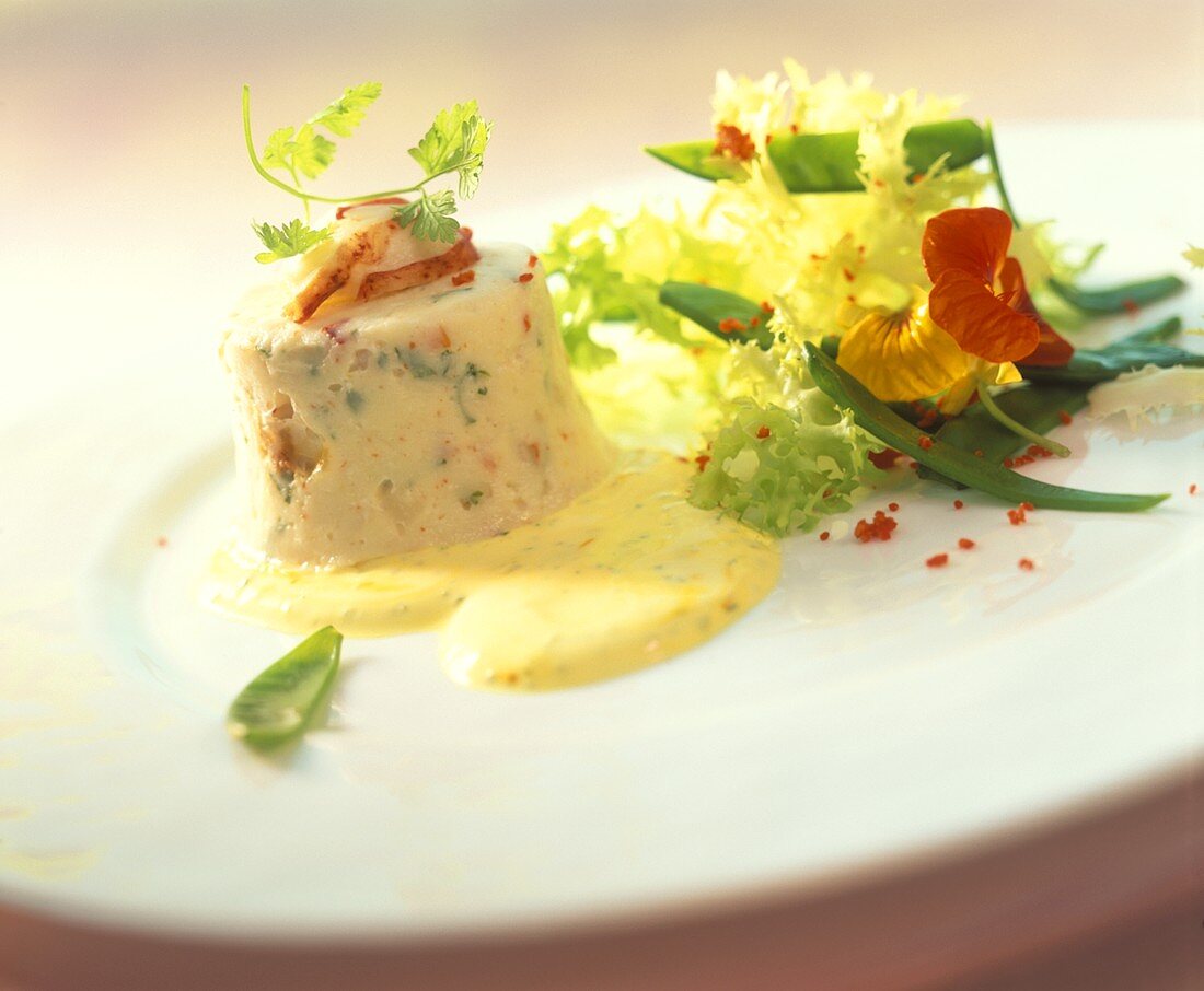 Cold timbale of lobster on lime and saffron sauce