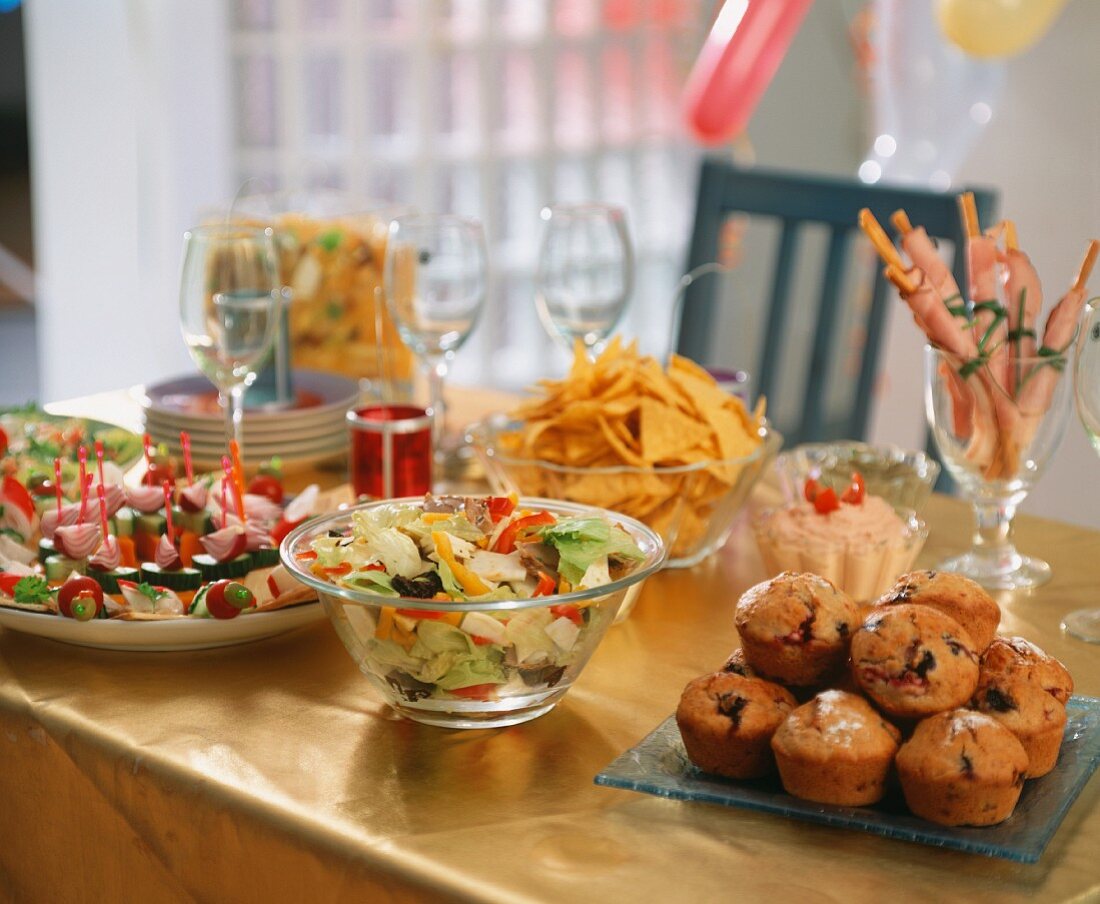 New Year's Eve buffet with snacks, appetisers, salad & muffins