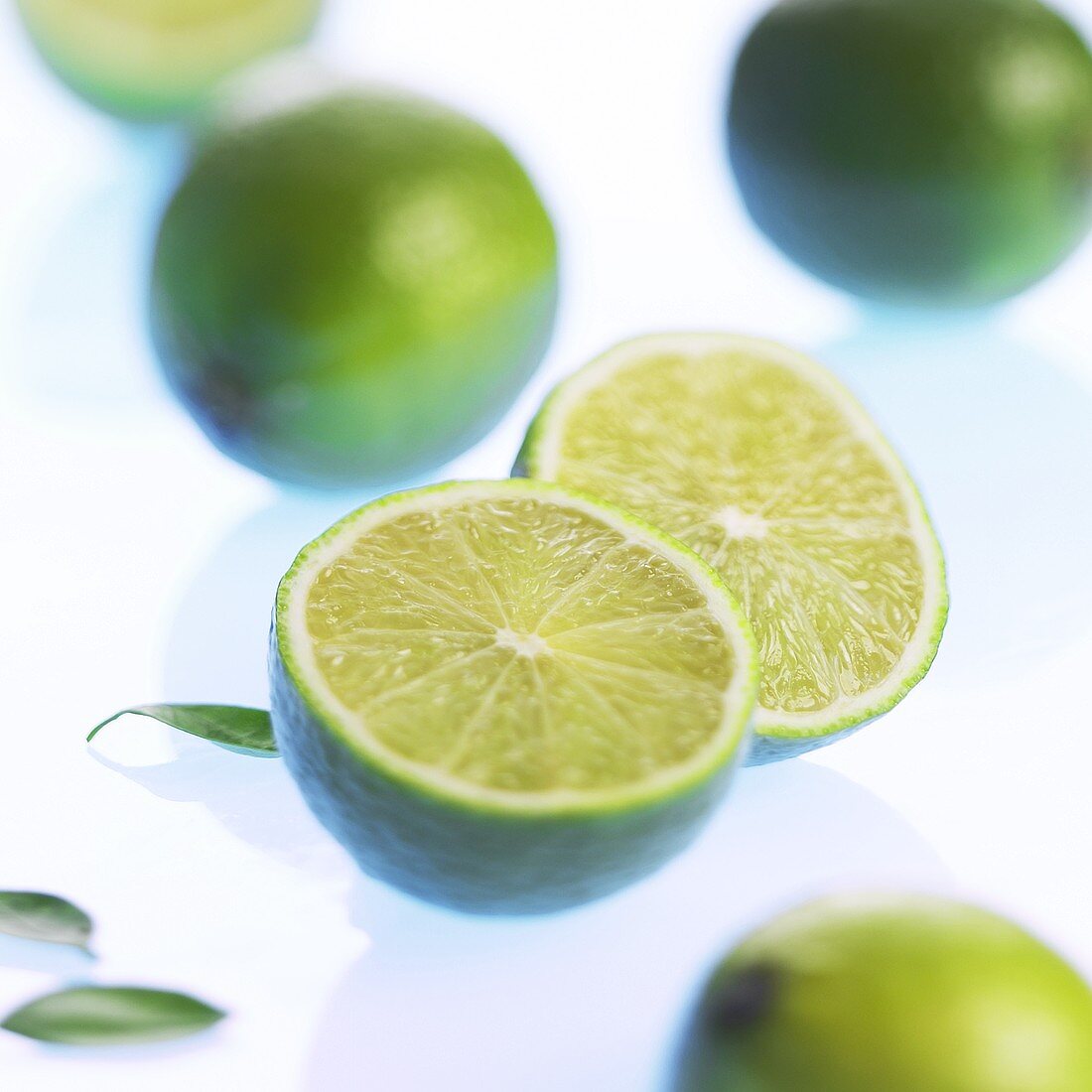 Limes, whole and halved