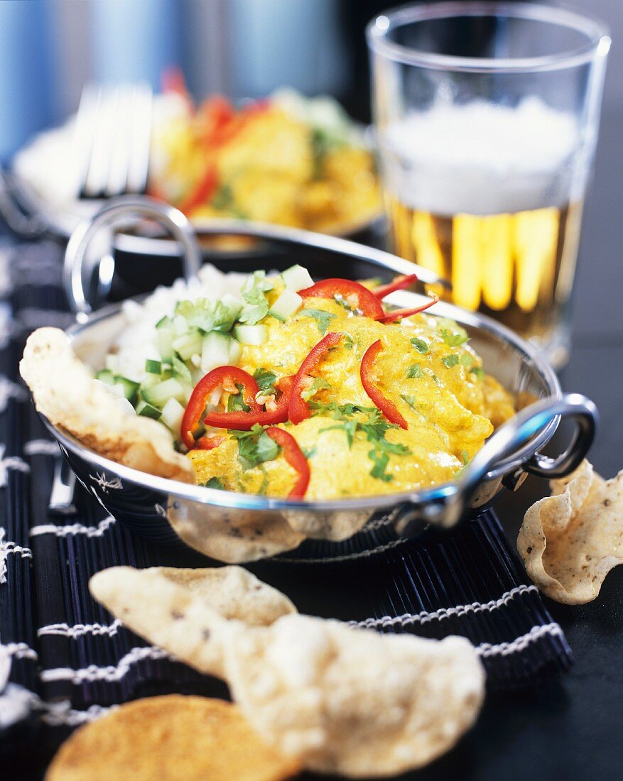 Scrambled egg with vegetables and poppadom