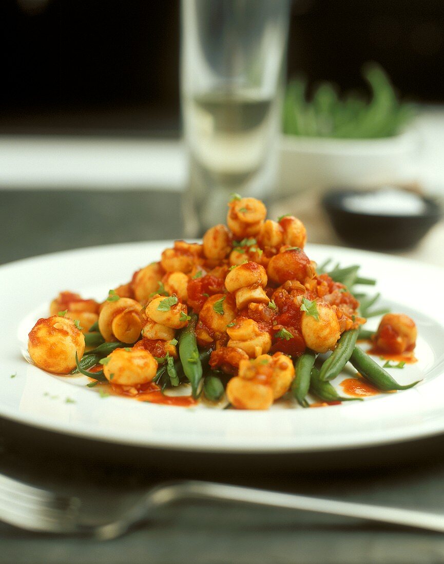 Mushrooms and beans with tomato sauce