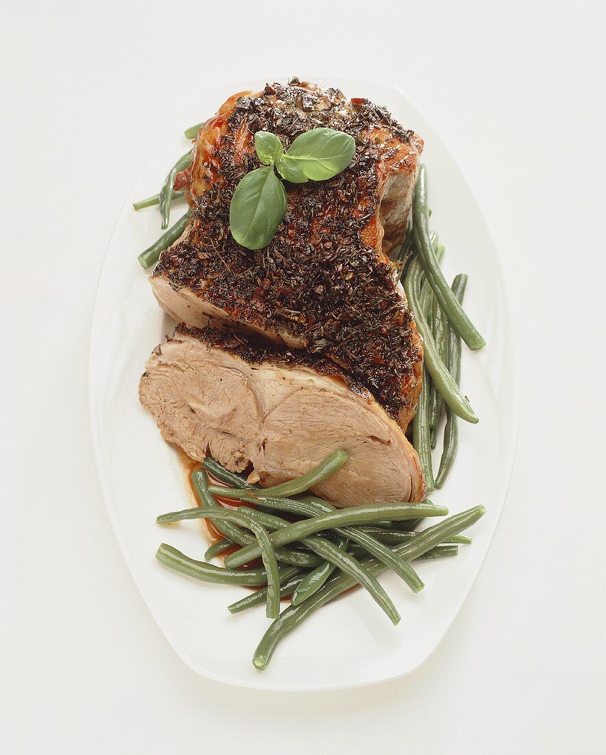 Leg of lamb with herb crust and green beans