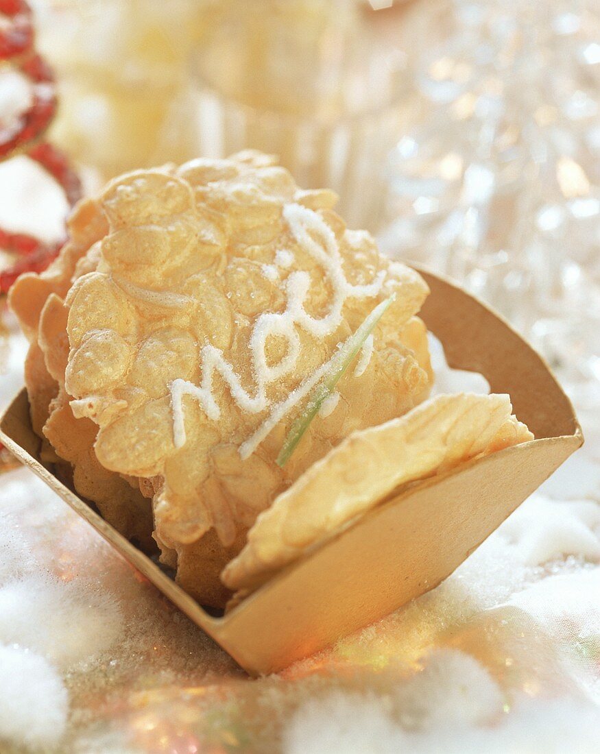 Almond meringue biscuits with the word "Noel"