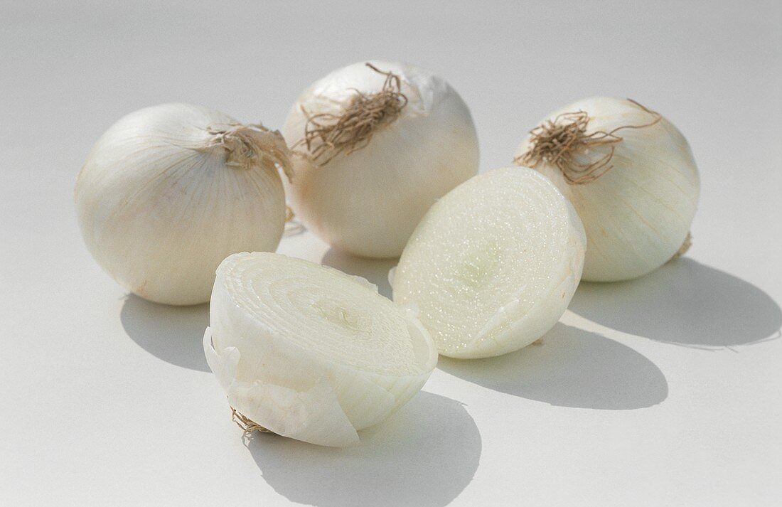 White onions, one halved