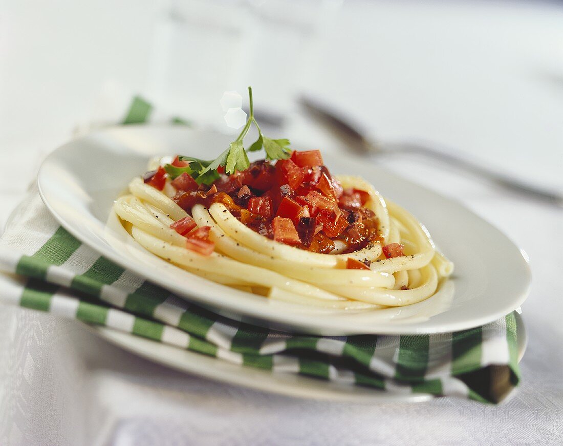 Macaroni with red pepper, anchovies and olives