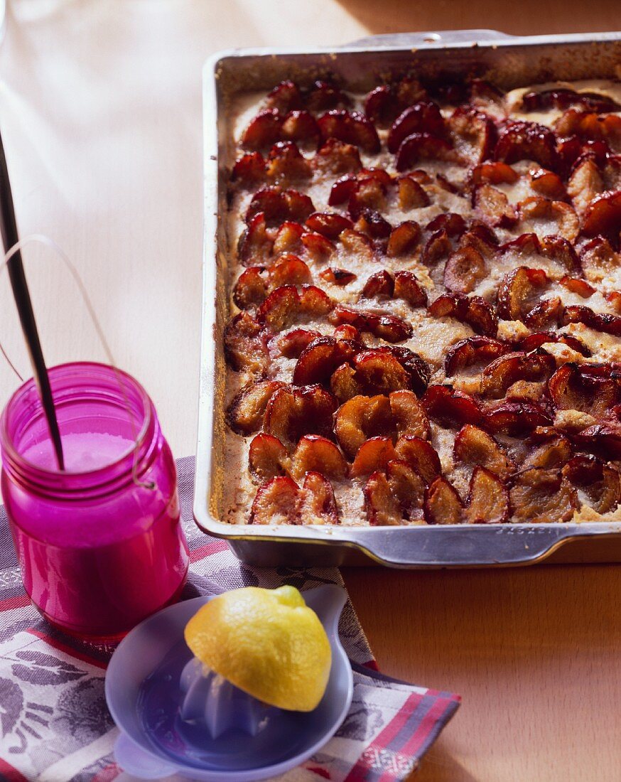 Tray-baked plum and walnut cake