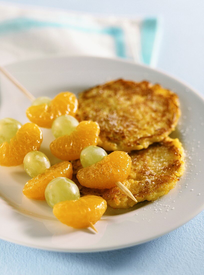 Sweet pumpkin and potato biscuits with fruit kebabs