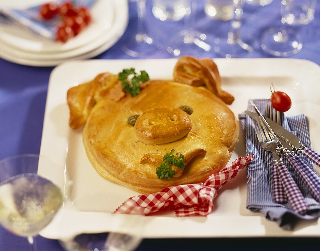 Partybrot in Form eines lustigen Schweinekopfs