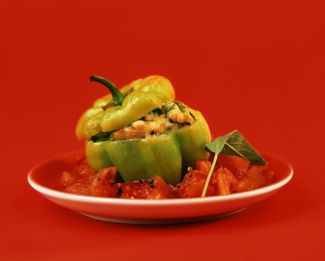 Stuffed pepper with tomato salad