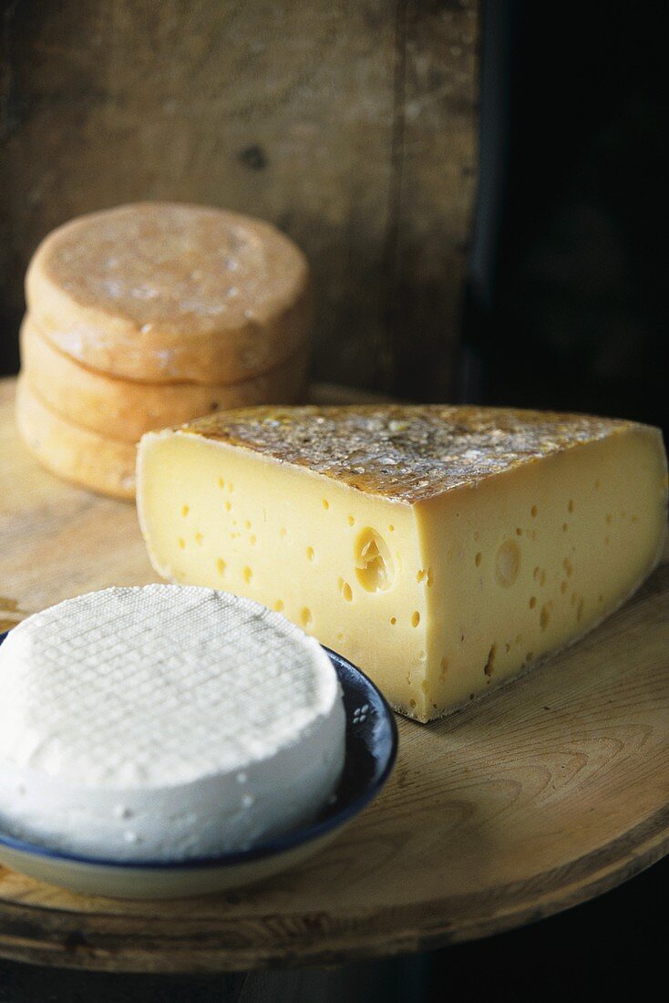 French soft cheese, cheese with holes and Munster cheese