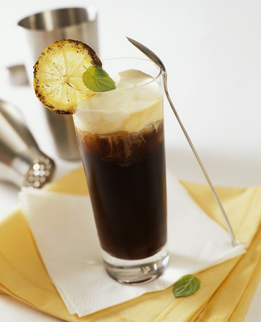 Cuban coffee with rum and lime in glass