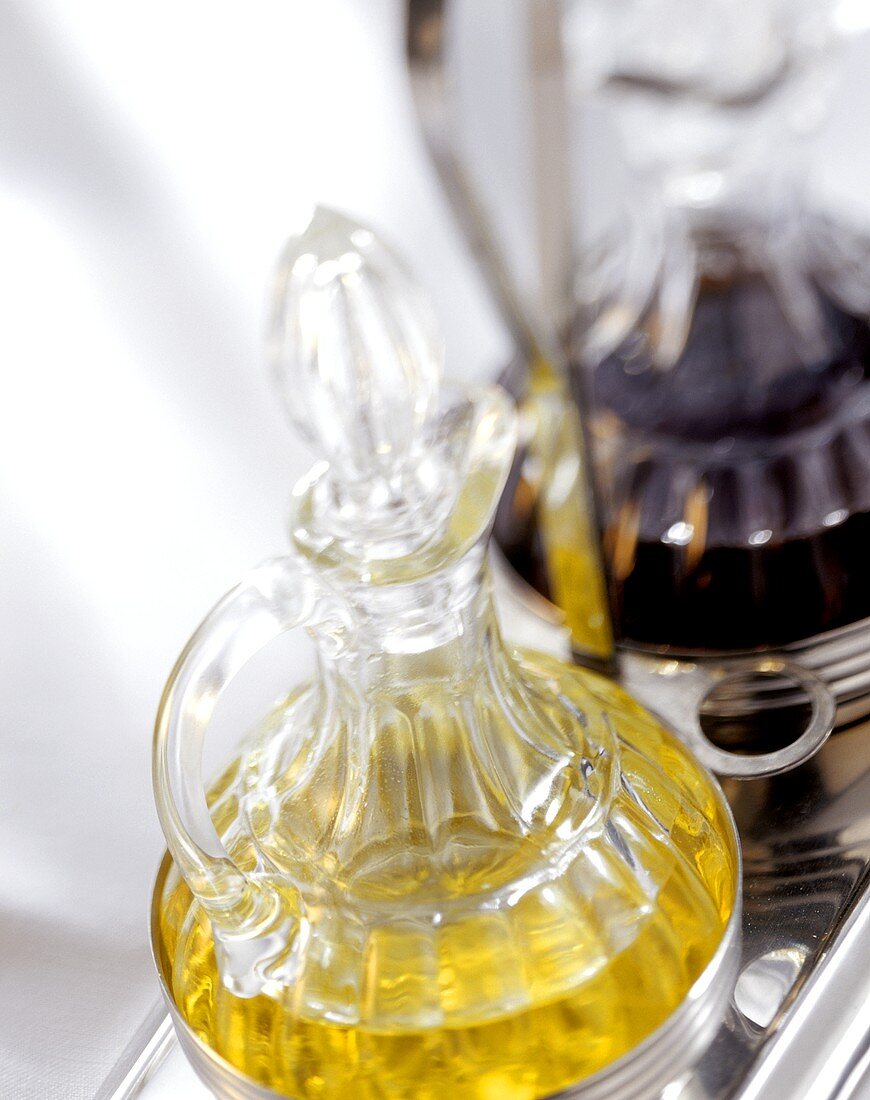 Carafes of oil and balsamic vinegar in a menage