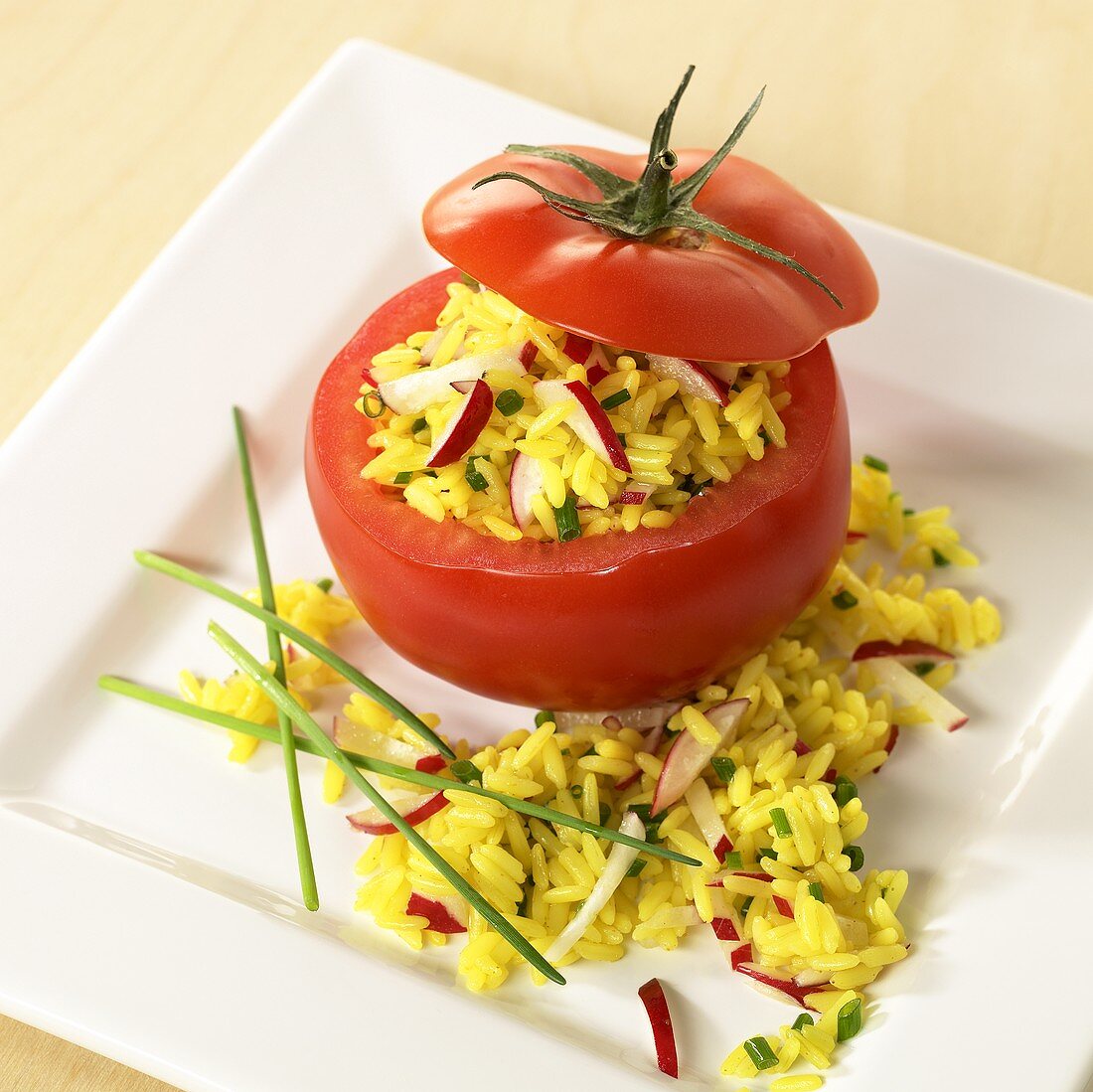 Tomato stuffed with curried rice
