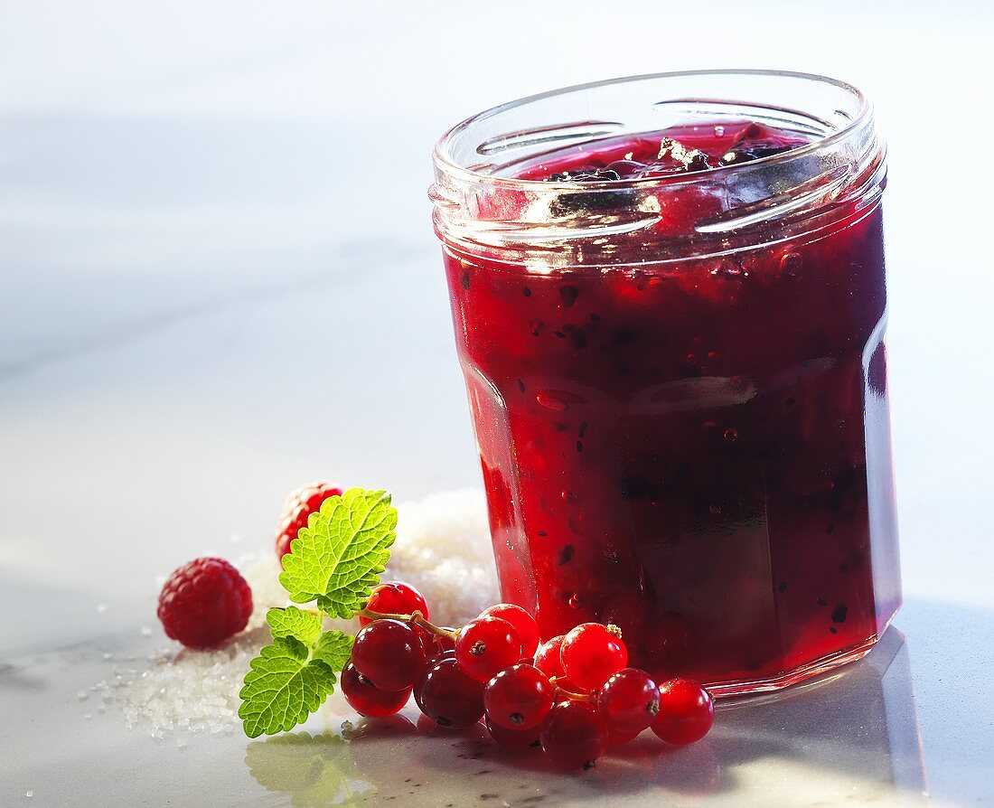 Redcurrant & raspberry preserve with berries & sugar