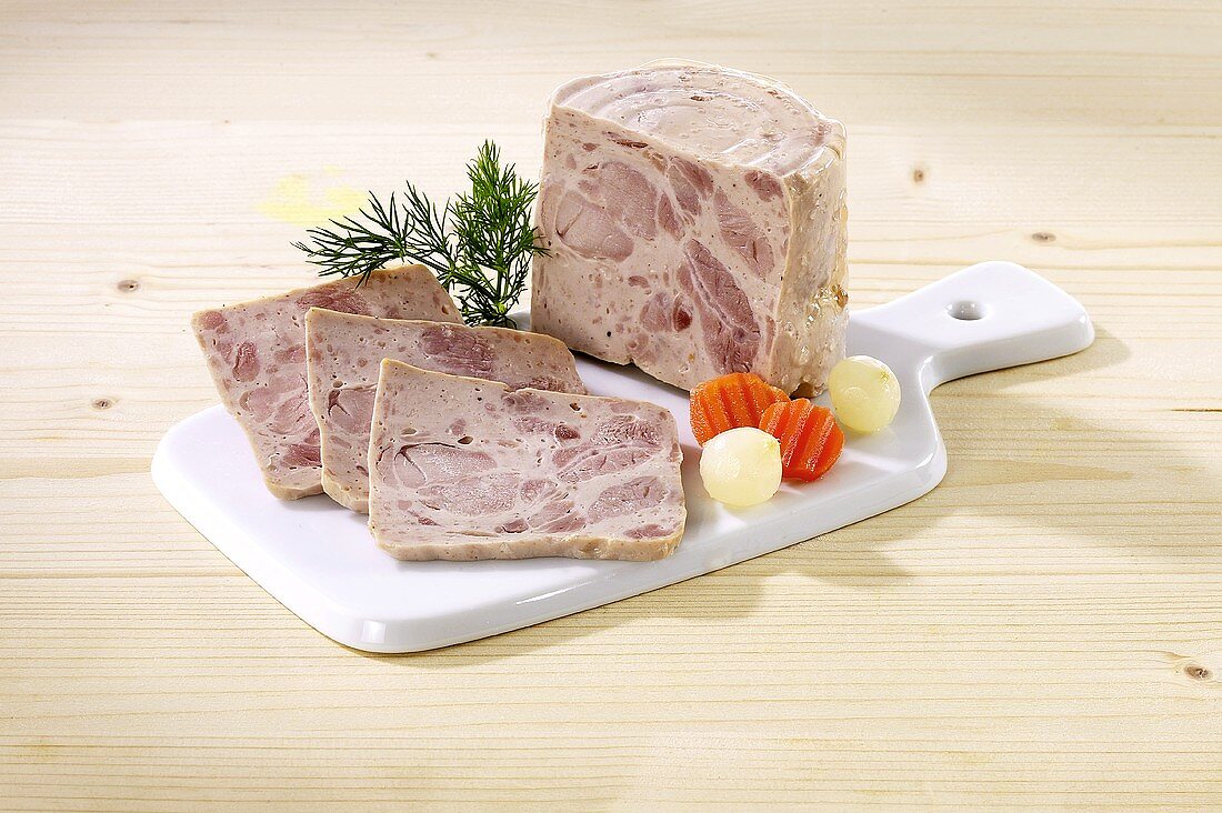Home-made ham sausage (Bierschinken)on a chopping board