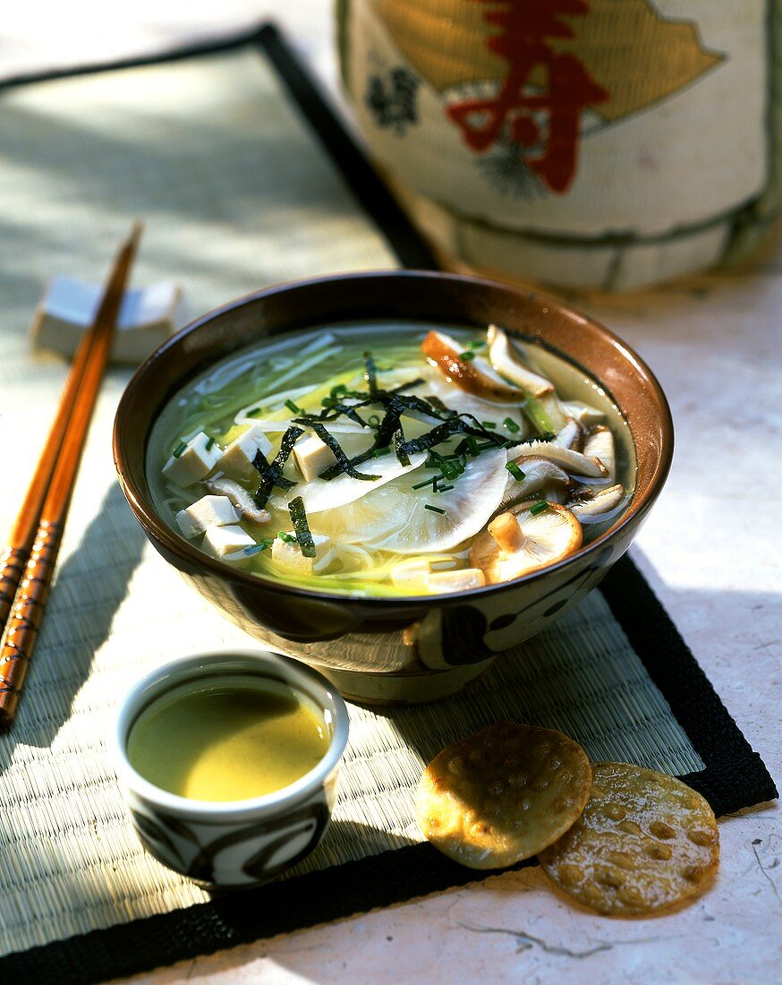 Japanese miso soup with tofu, radish and mushrooms