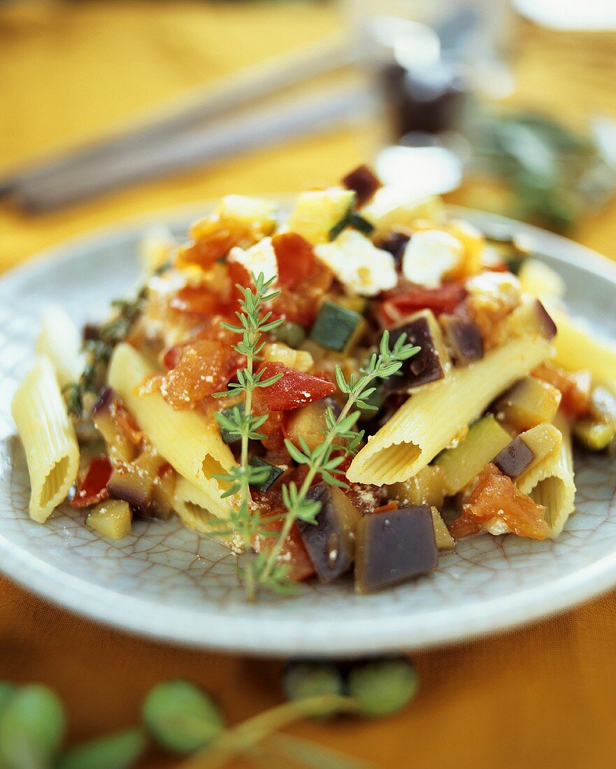 Penne with tomatoes, courgettes, aubergines & ricotta