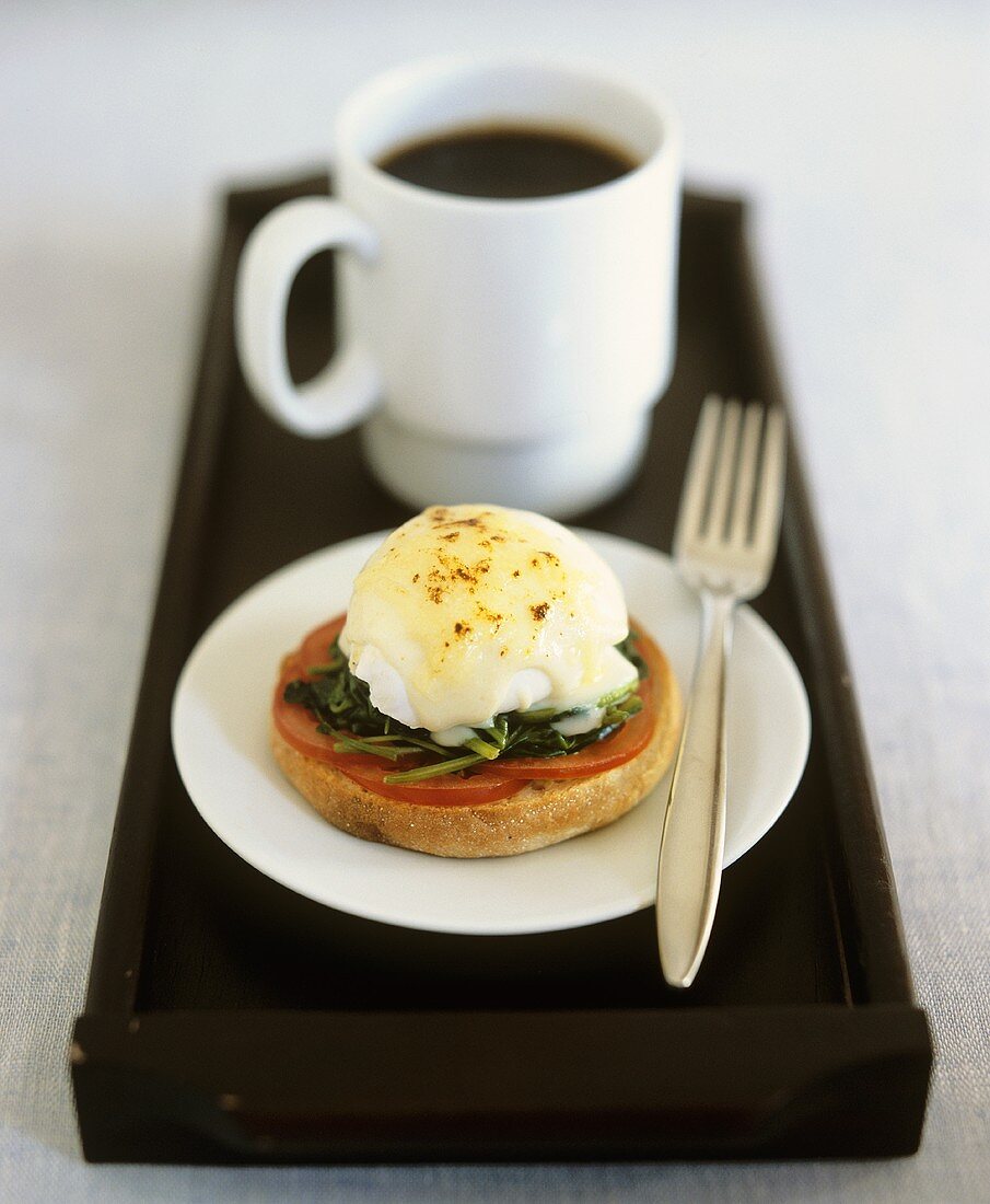 Egg Florentine (poached egg Florentine style); cup of coffee