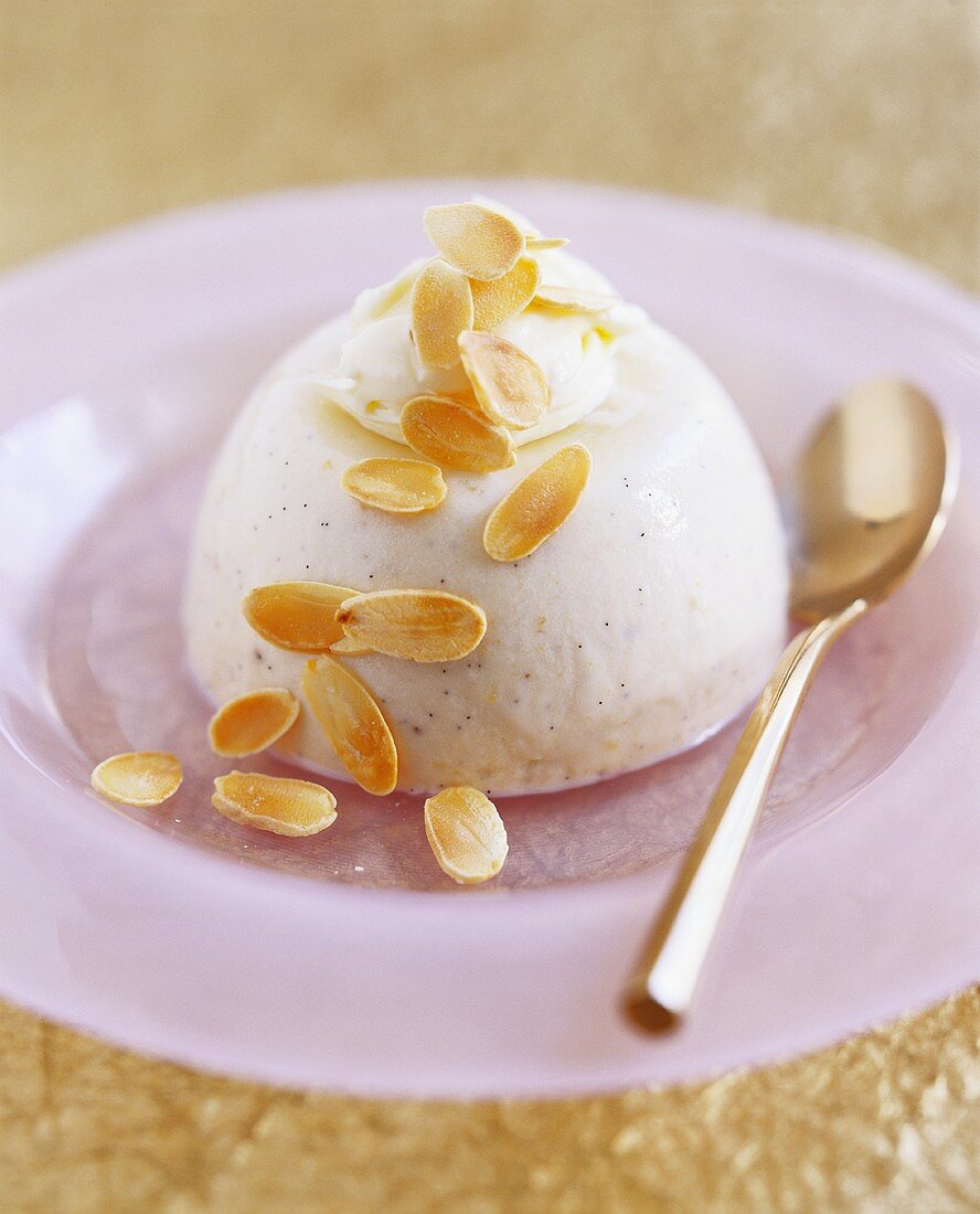 Panna cotta with cream and flaked almonds