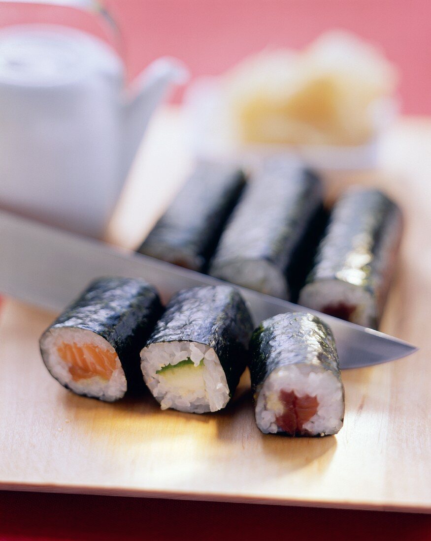 Maki-sushi with salmon, cucumber, tuna