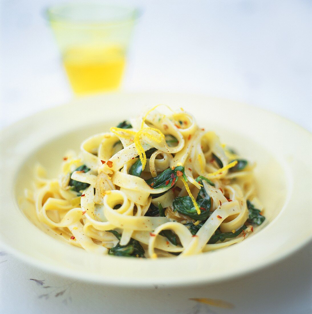 Tagliatelle with spinach and chili and lime sauce