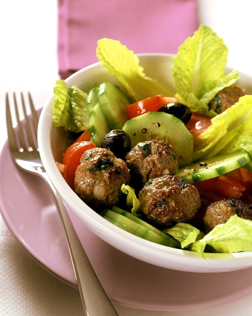 Meatballs in Greek salad
