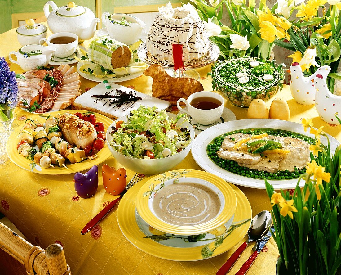 Easter table laid with sweet and savoury dishes (Poland)