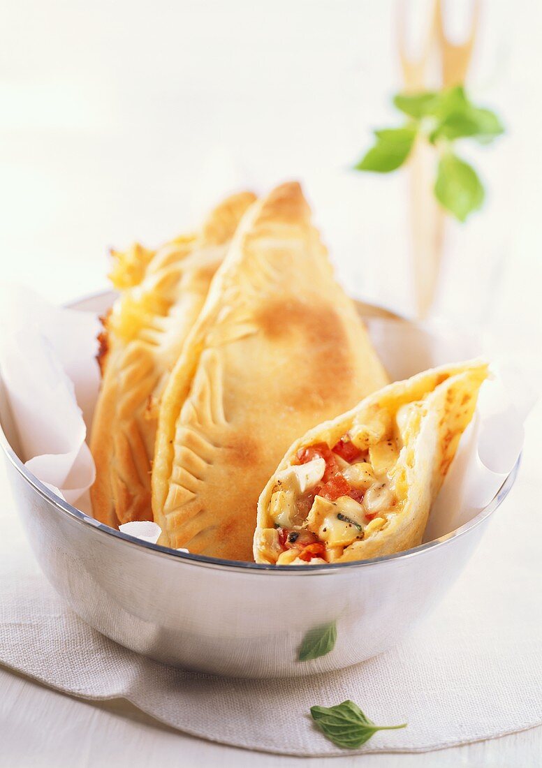 Filled pizza turnovers with Romadur and vegetable filling