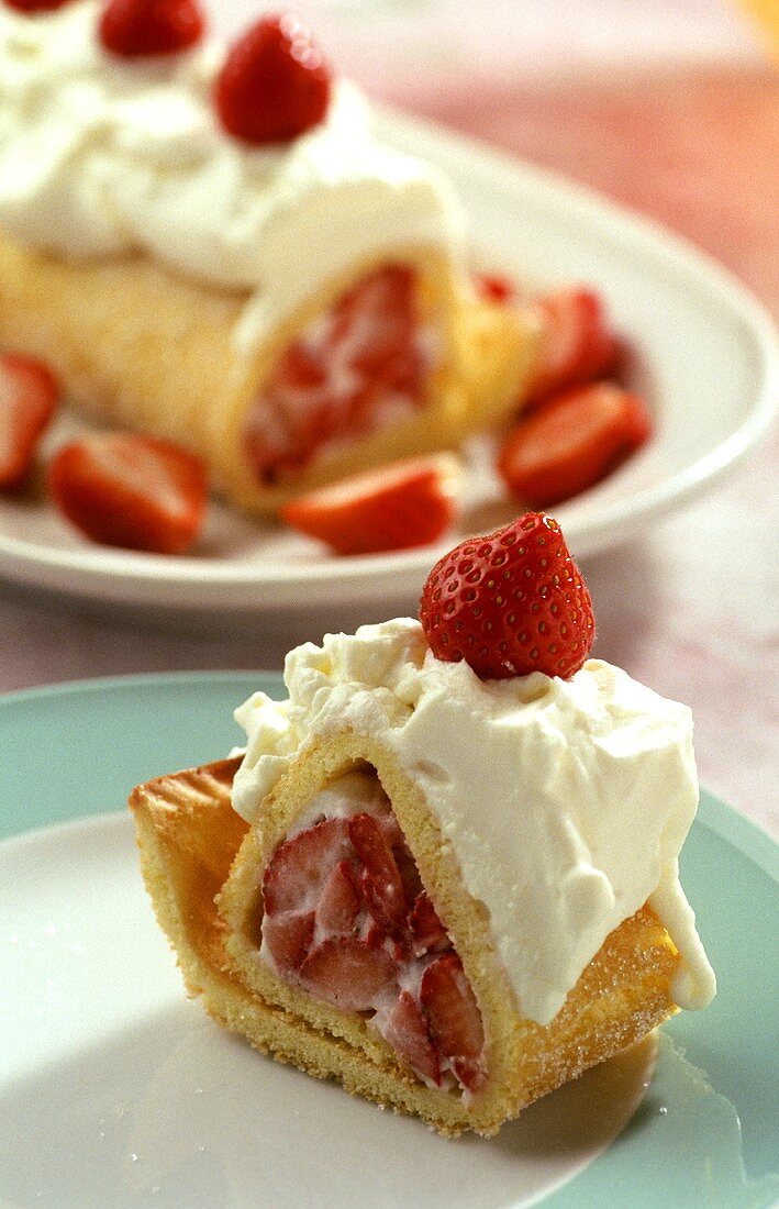 Sponge roll with strawberry and cream filling