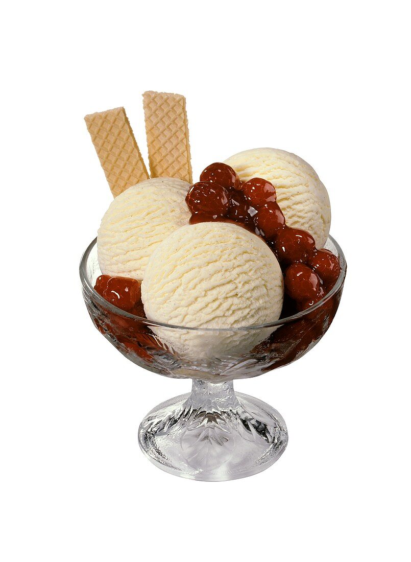 Ice cream sundae with vanilla ice cream cherry compote & wafers