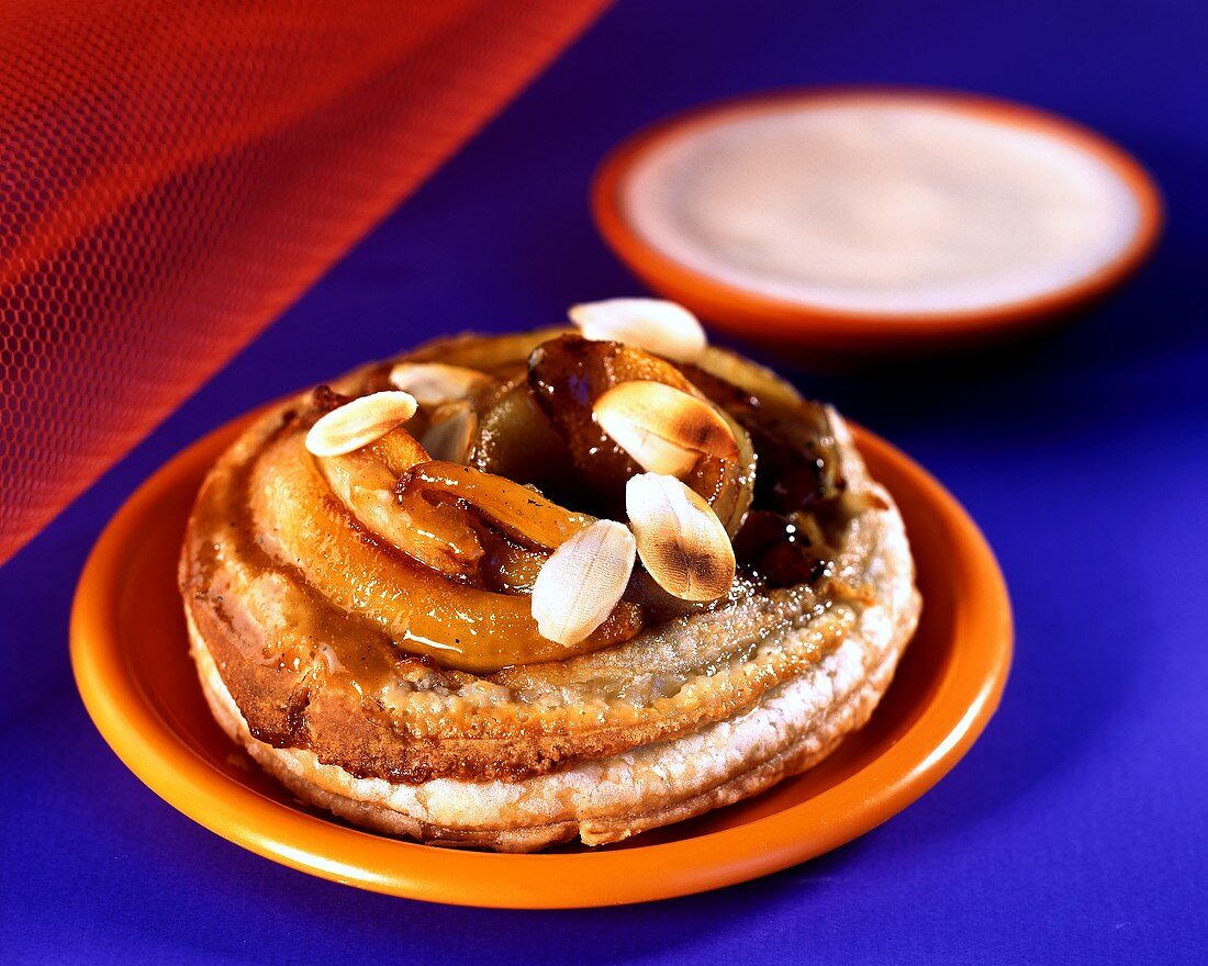 Puff pastry with pears, almonds and almond sabayon