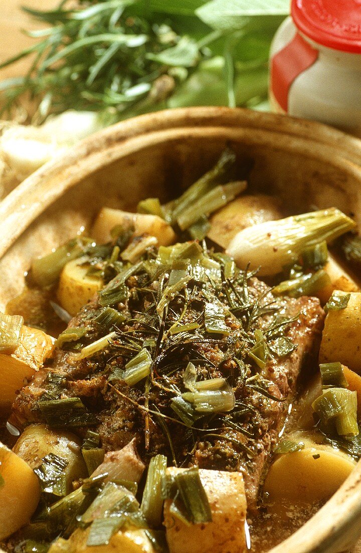 Roast pork, Tuscany style, with herbs in a Römertopf