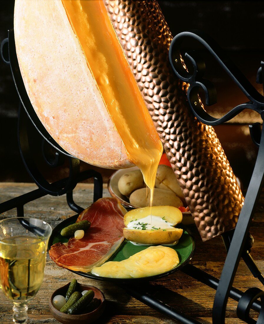 Traditional Swiss raclette with melting cheese