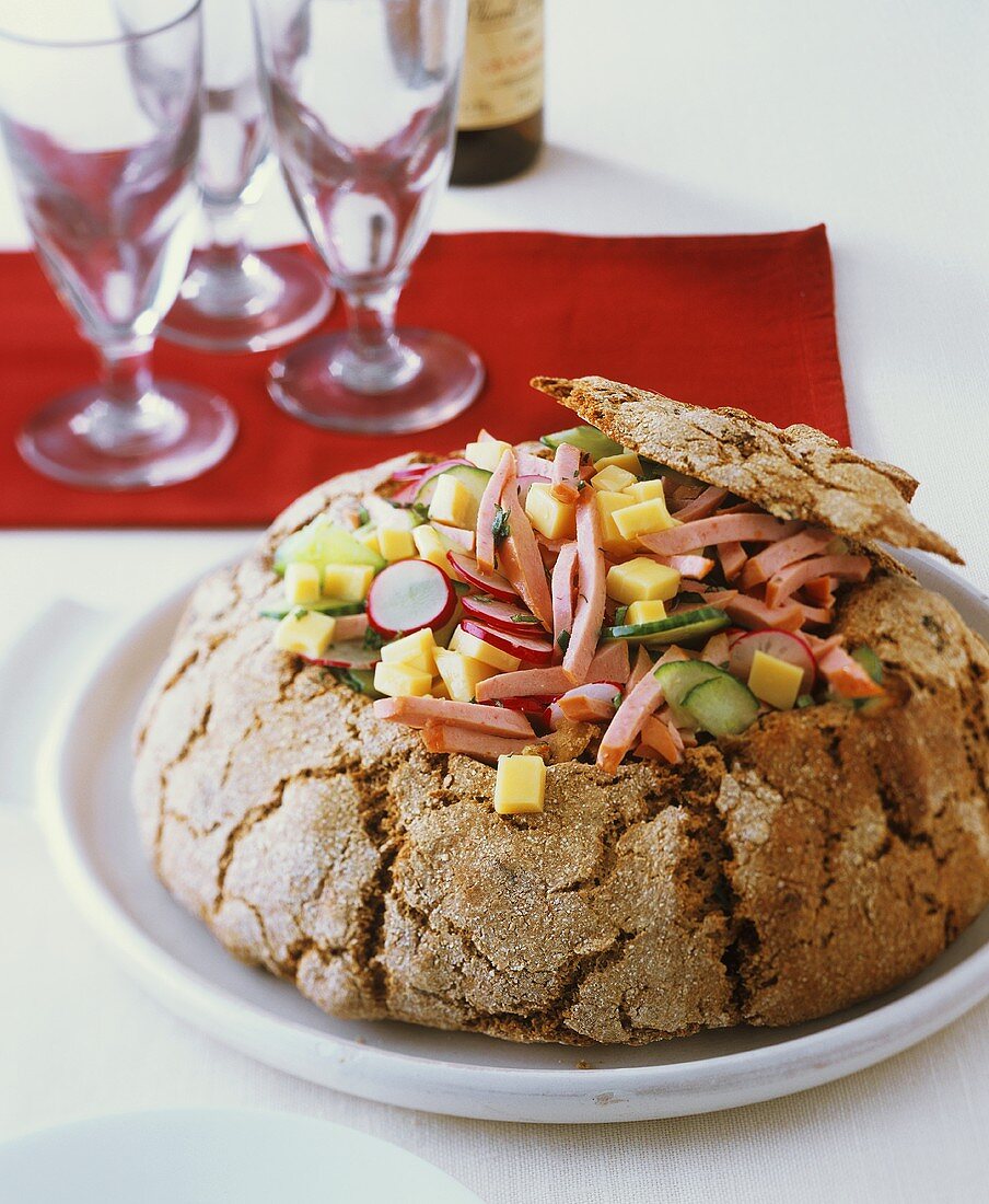 Farmhouse bread filled with cheese and sausage salad