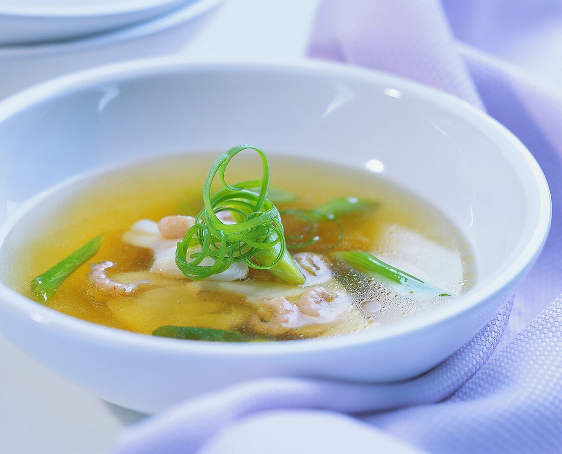 Clear spring onion soup with shrimps