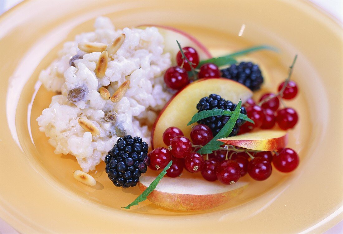 Sweet risotto with pine nuts and fruit