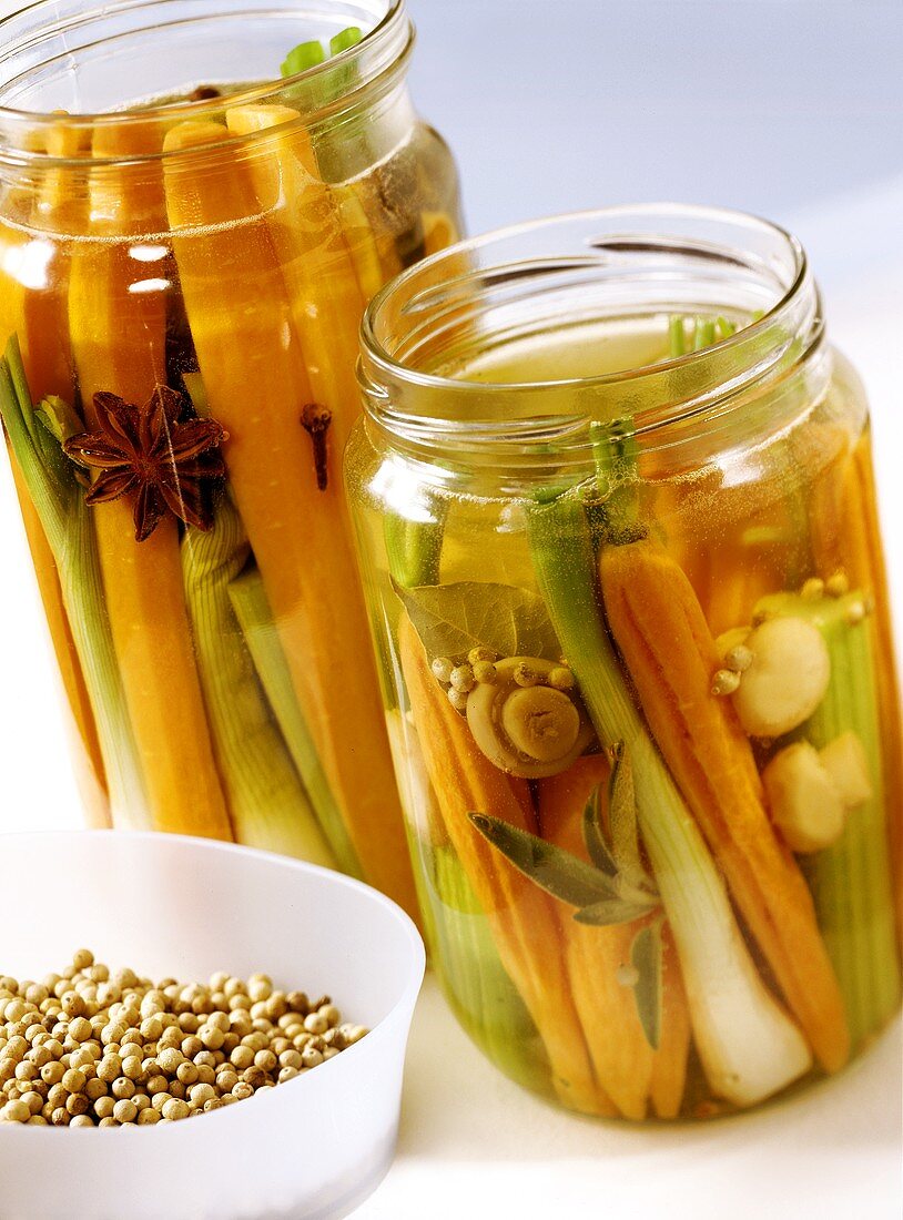 Two versions of sweet and sour bottled carrots