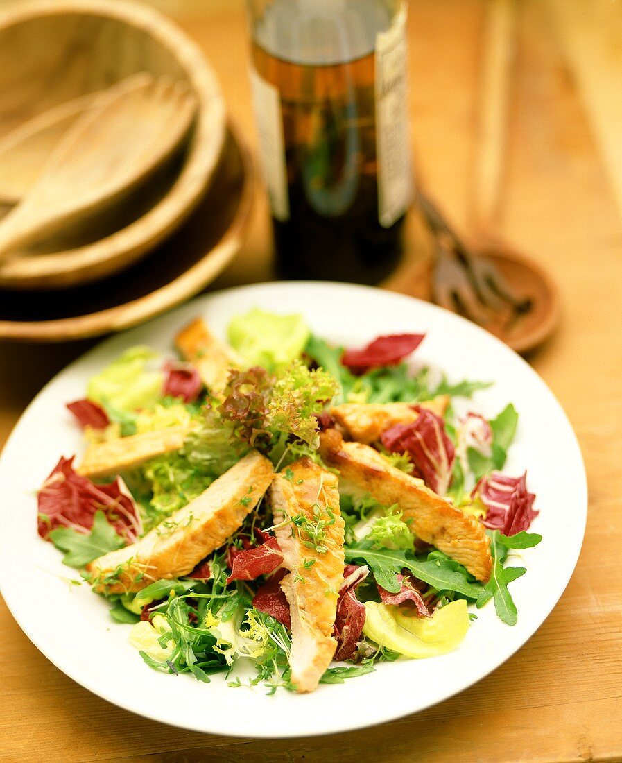 Mixed salad leaves with turkey strips