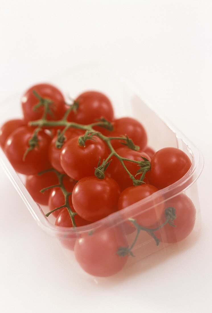 Cherry tomatoes in a plastic container