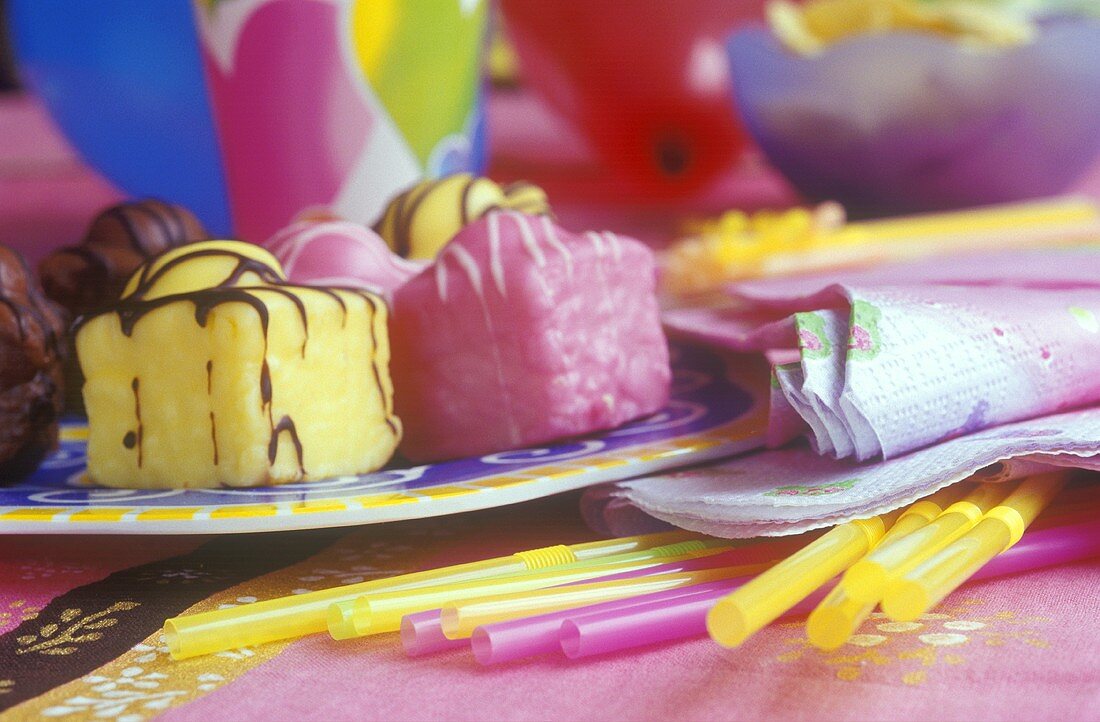 Petit fours on a colourful party table
