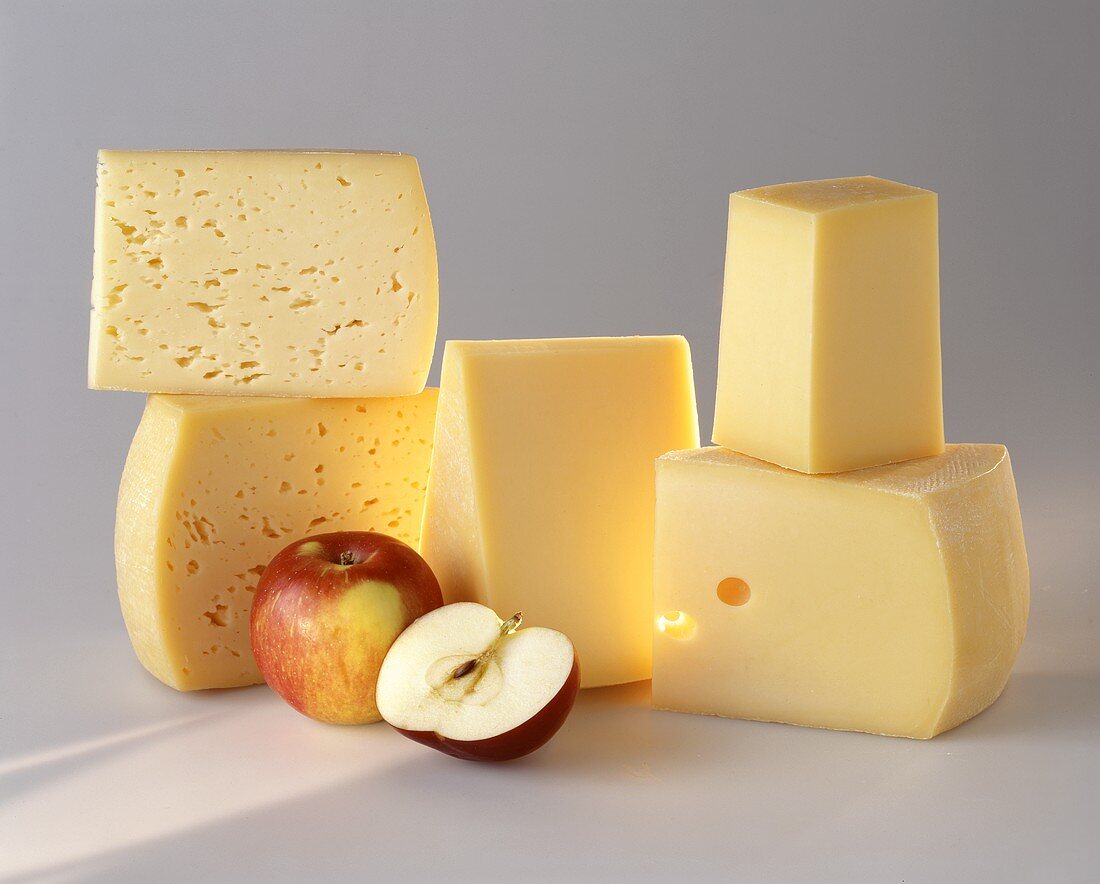 Various types of hard cheese from Carinthia and apples