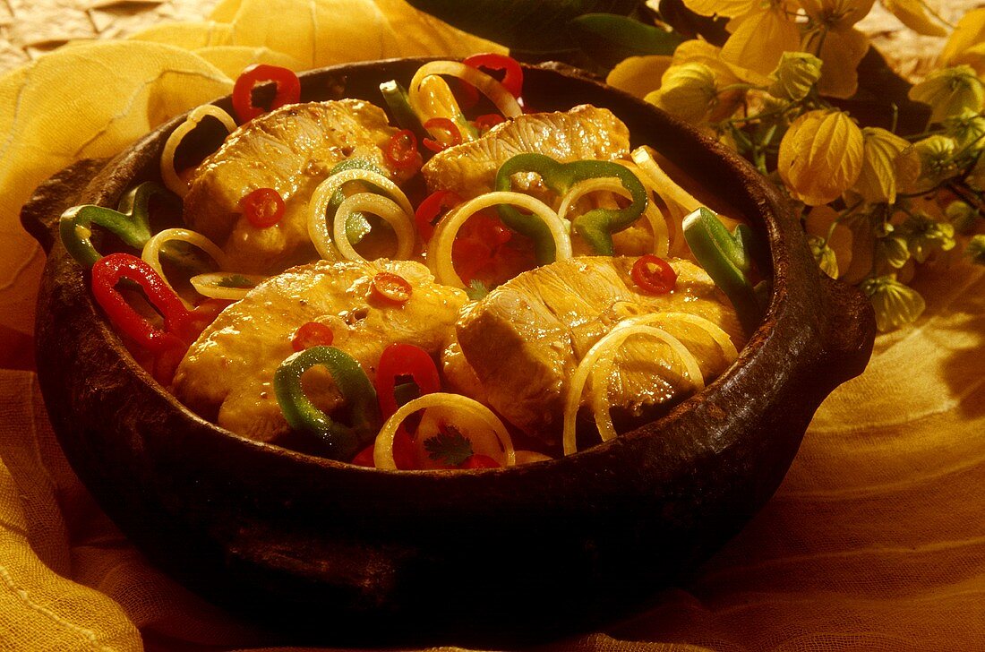 Bacalhau (stockfish steaks with peppers & onions, Brazil)