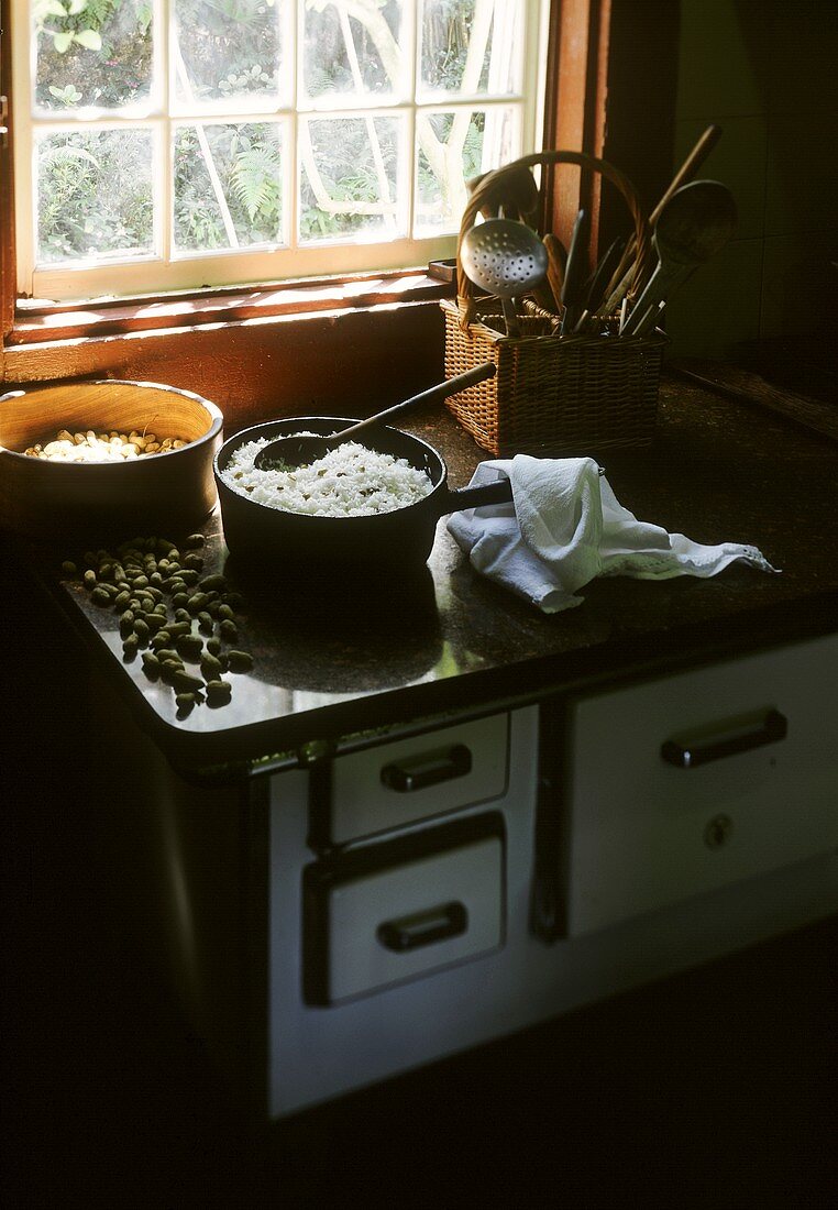 Pan of peanut rice on a stove in Brazilian kitchen