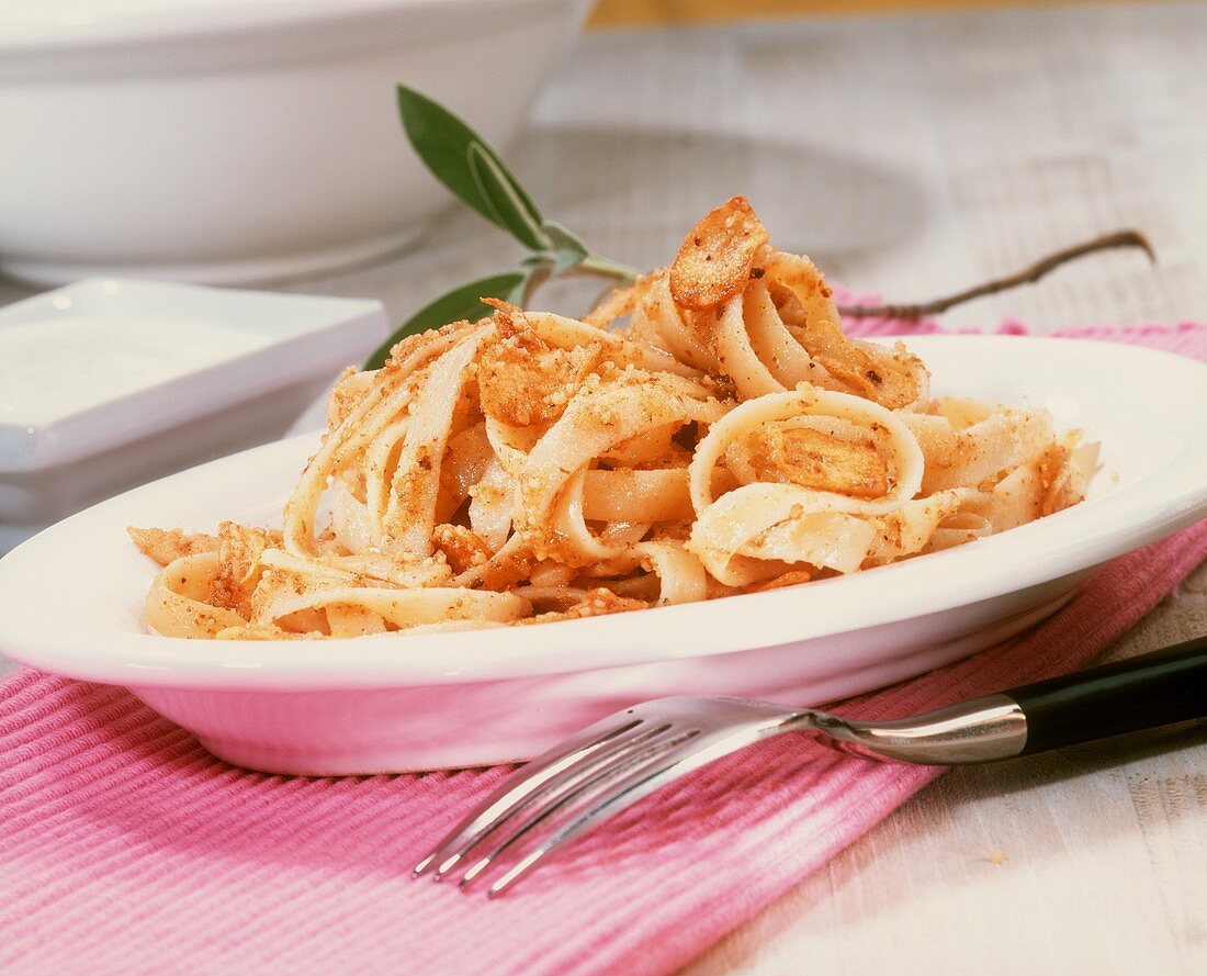 Pasta in cream sauce with walnuts