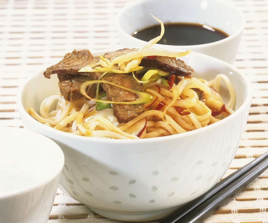 Asian noodle salad with beef; soy sauce