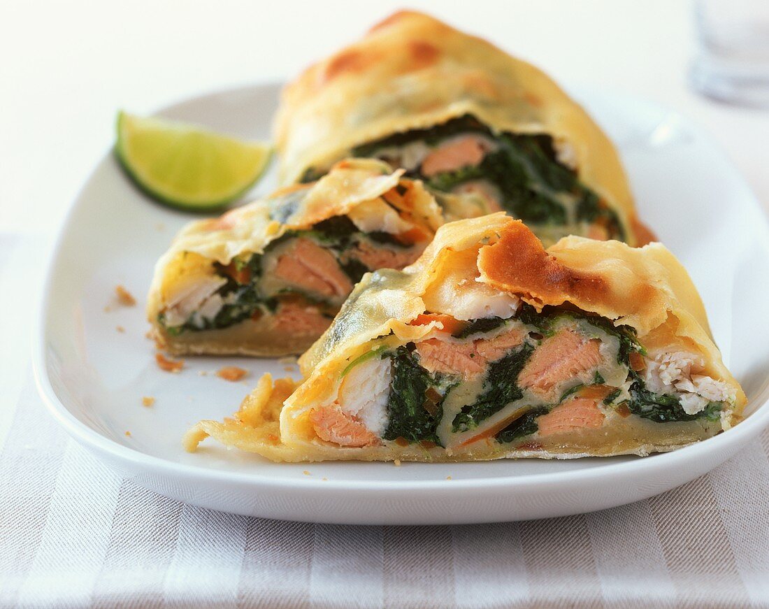 Salmon and pike-perch strudel with spinach